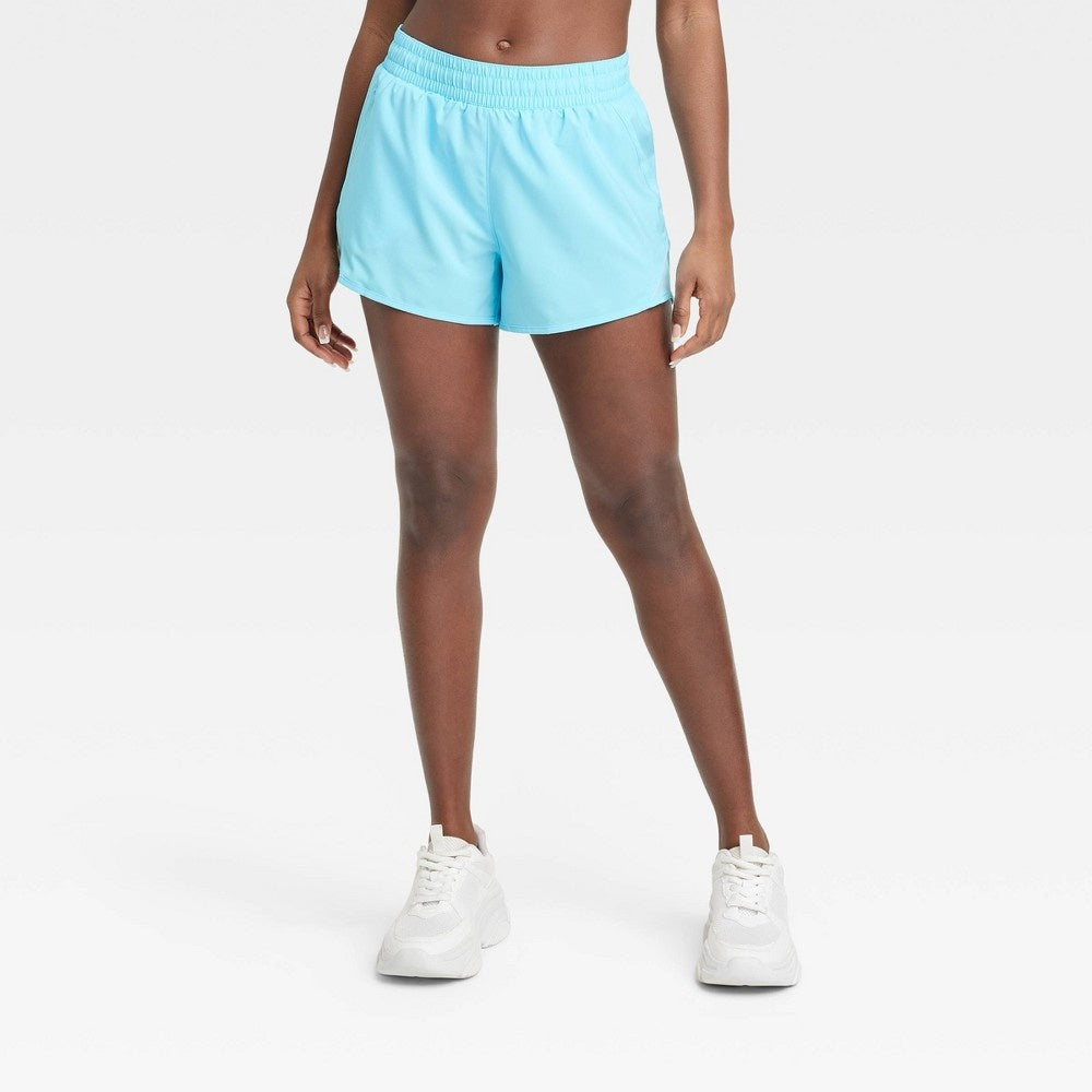 Women's Woven Mid-Rise Run Shorts 3" - All in Motion™ Light Blue L